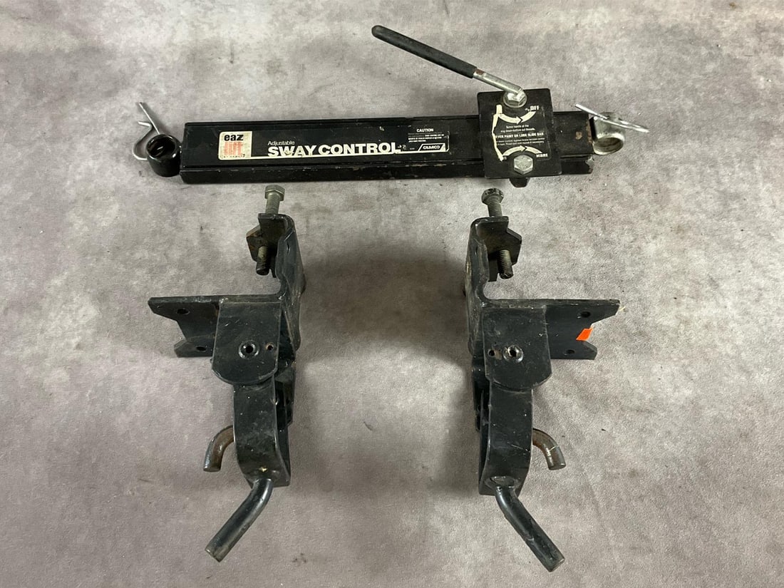 Sway Control Bar & Brackets: Camco eaz-lift adjustable sway control bar and weight distribution brackets. Used. Largest item measures 20 inches long X 7 inches wide X 3 inches high.