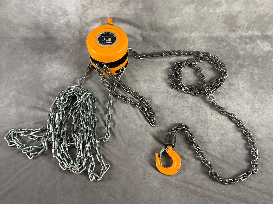 Chain Hoist: Central Machinery 1 ton hoist. 10 feet of lift. Used in good condition. Measures 6 inches in diameter X 5 inches wide X 9 inches high.