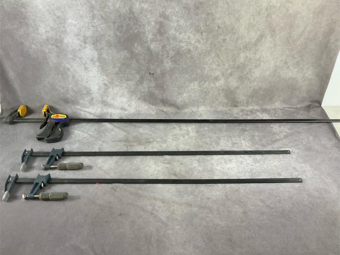 Bar Clamps: Three Adjustable bar clamps. One 4 foot and two 3 foot capacity. Used, otherwise in good condition. Largest measures 58 inches long X 9 inches wide X 1 1/2 inches high.