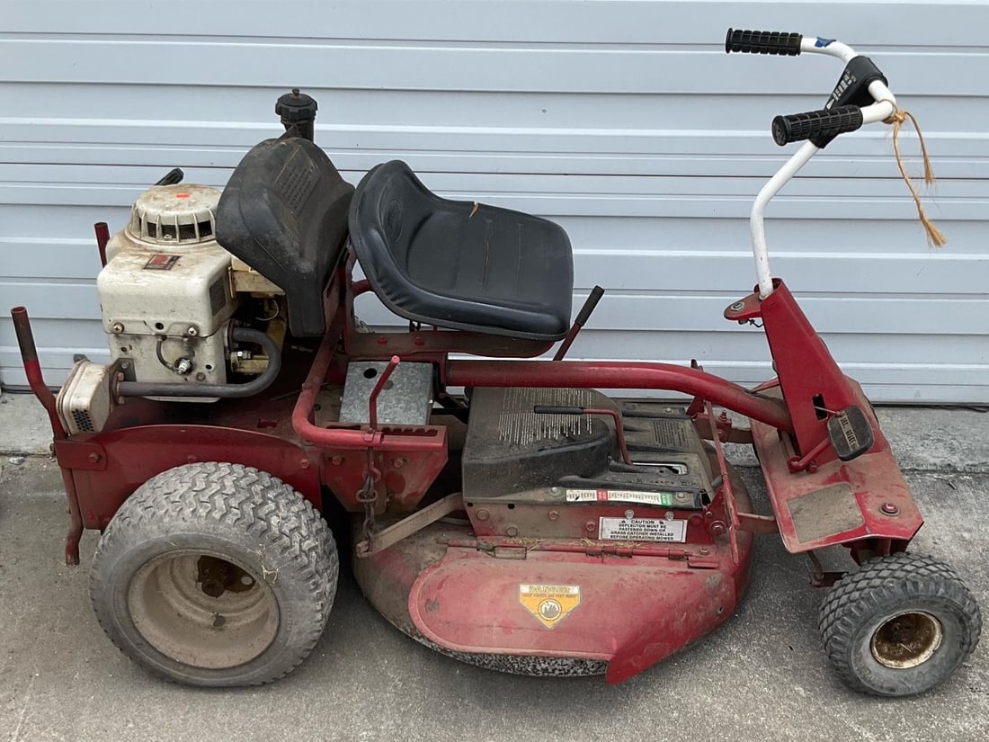 Snapper Riding Lawn Mower: Vintage Snapper mower, 8 hp Tecumseh engine. 28 inch cut. Used, untested. Measures 62 inches long X 30 inches wide X 37 inches high. Just like the one Forest Gump rode.