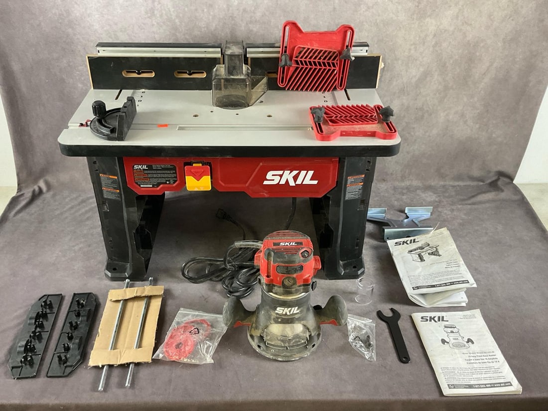 Skil Router, Router Table & Accessories: Router model RT1323-00 and Router table model SRT1039. Includes miter gauge, feather boards and owner manuals. Used router powers up and all in good condition. Table measures 26 inches long X 16