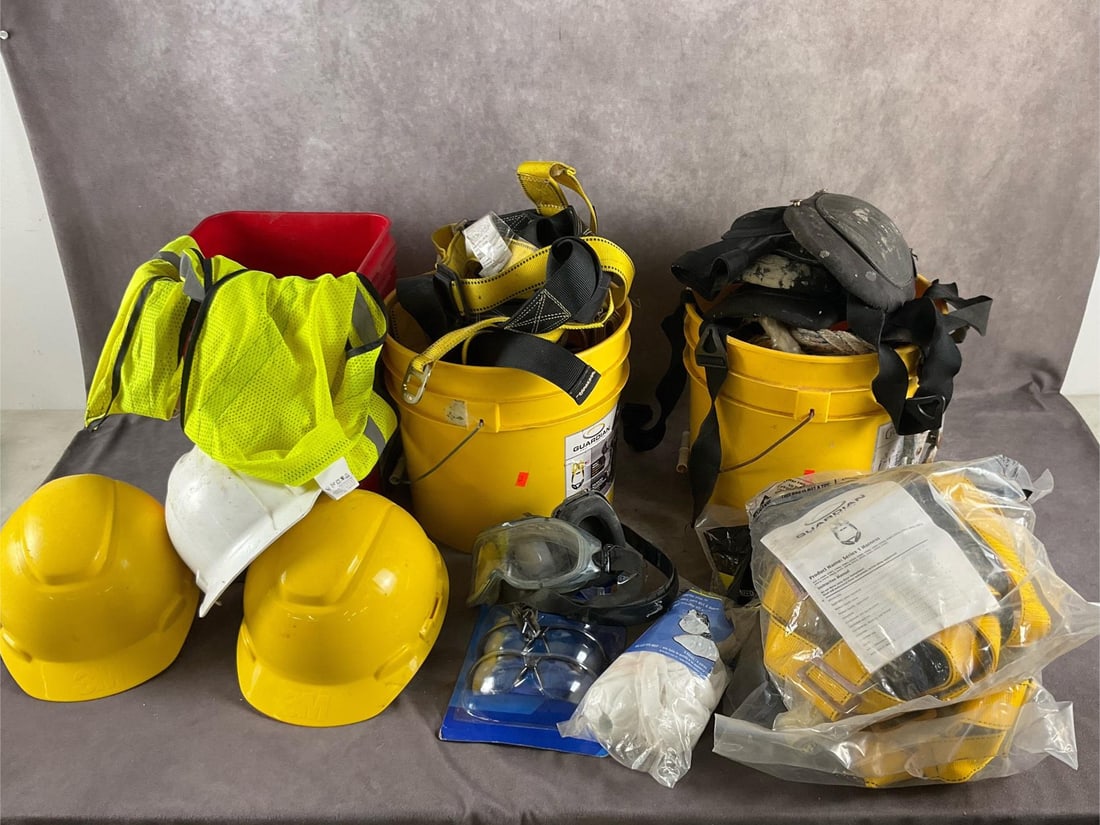 Safety Equipment: Hard hats, safety glasses, harnesses, tag line, vests, shoe guards, knee pads and buckets. Some new, some used, all in good useable condition. Bucket measures 10 inches wide X 10 inches deep X 13,5