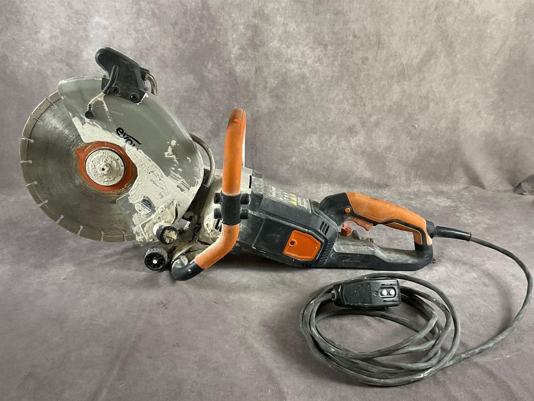 Evolution Concrete Saw: R300DCT 12 inch electric concrete saw. 4 1/2 inch cut capacity. Used, powers up and in good condition. Measures 32 inches long X 11 inches wide X 16 inches high.