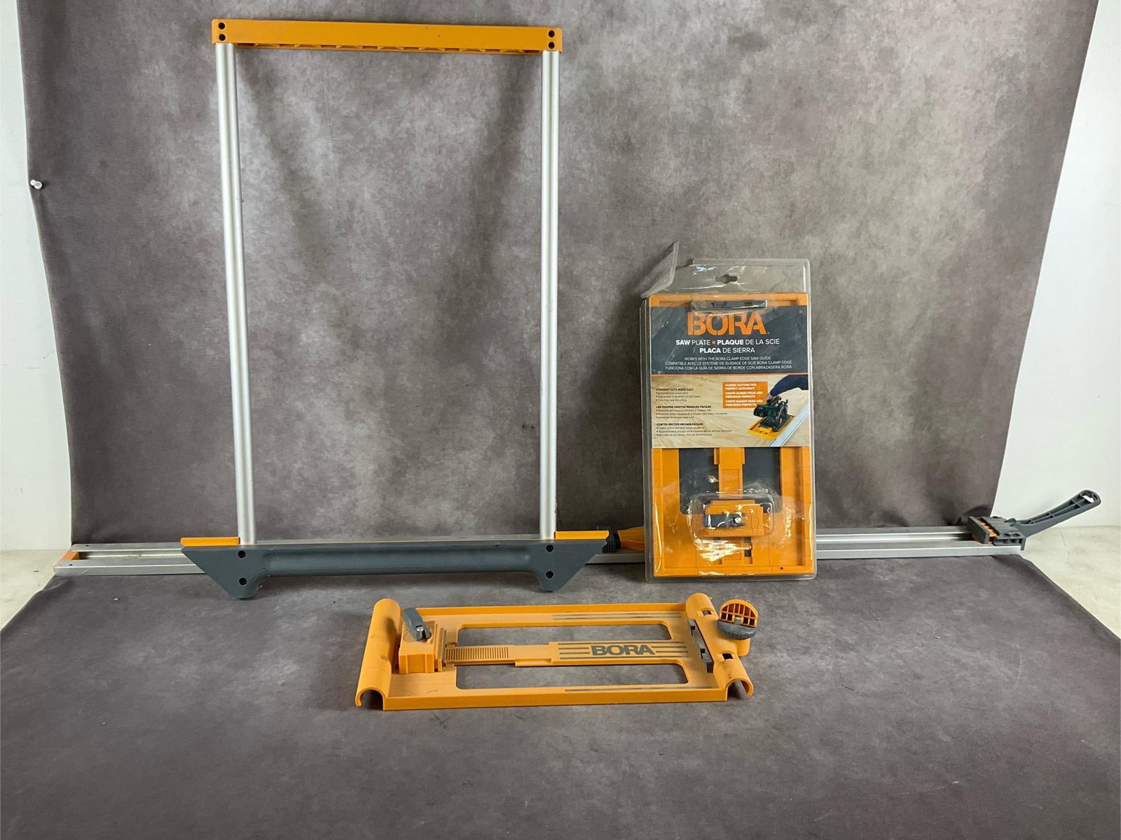 Bora Saw Plate & Rip Guide: Plate and guide for use with circular saws. Used and in good condition. Guide rail measures 62 inches long X 3 inches wide X 3 inches high.