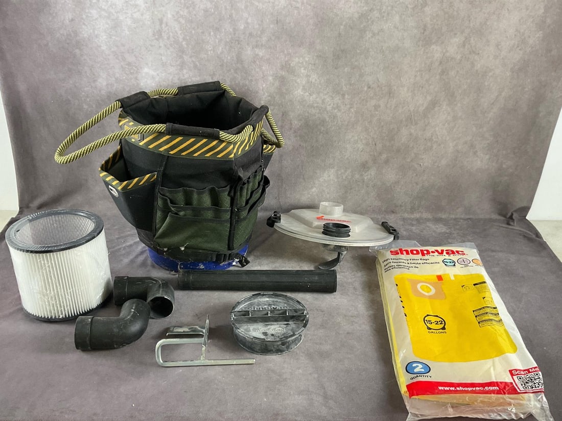 Shop-Vac Accessories: Eight Shop-Vac items and a bucket. Filter and filter bags among the new and used items. Bucket measures 13 inches in diameter X 15 inches high.