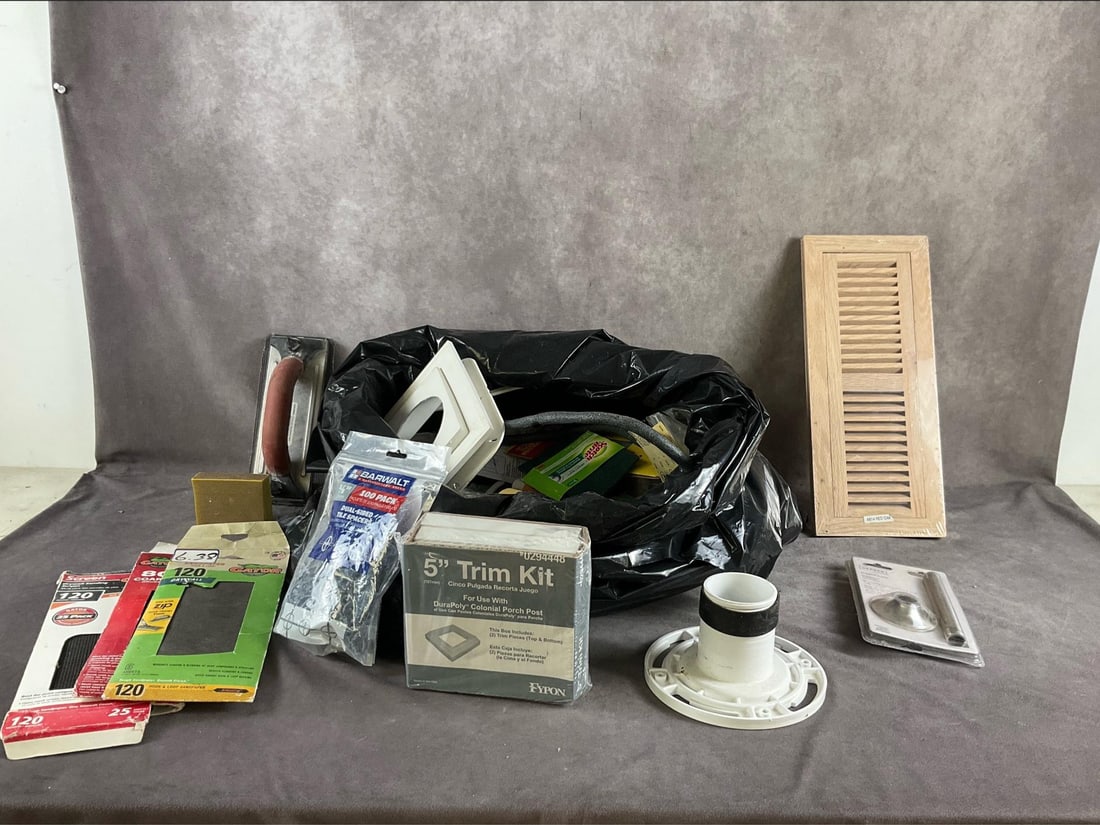 Bag of Assorted Items: Floor register, drywall sanding tools, tile spacers, trim kit and various plumbing items. Some new, some used. Bag measures 24 inches in diameter X 16 inches high.
