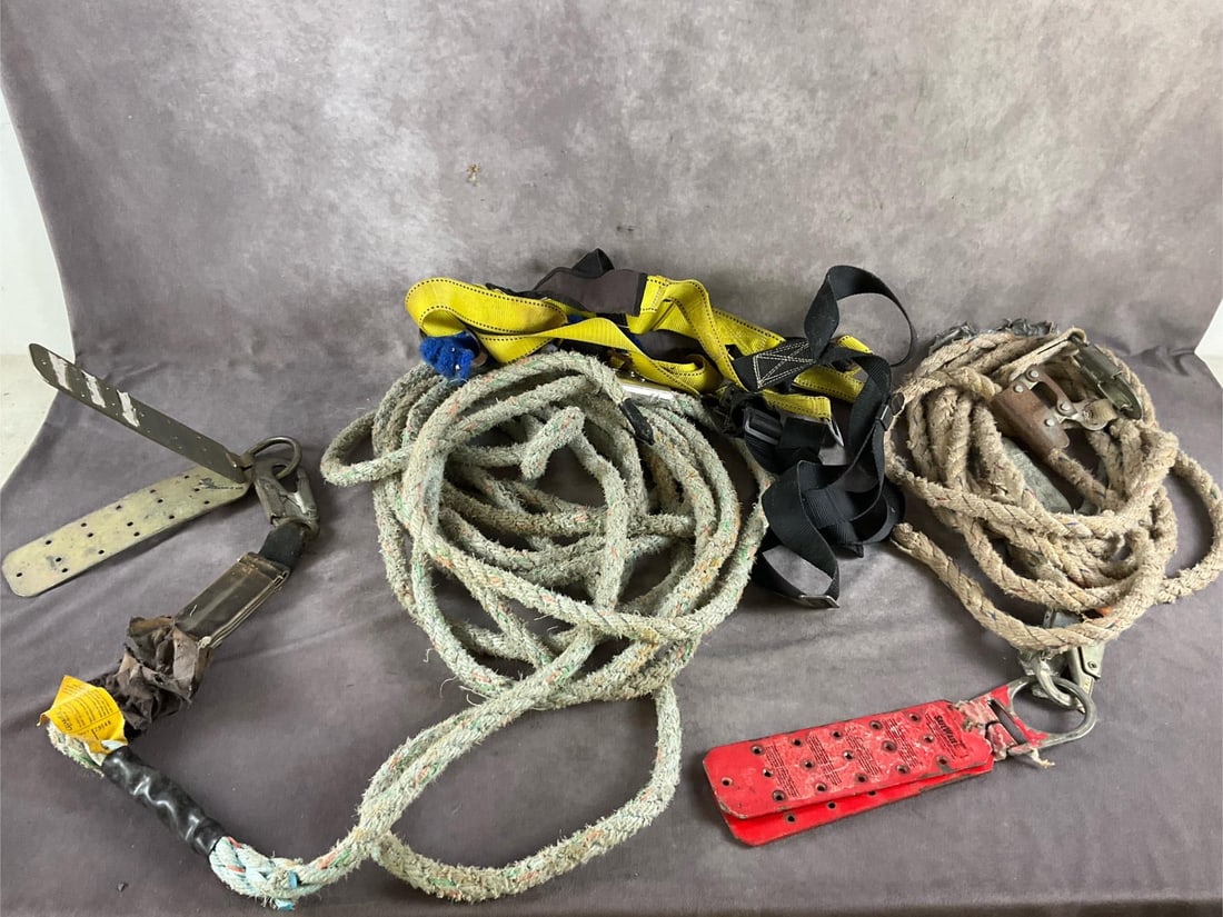 Fall Protection: Roof anchor with rope and harness. Used, in working condition. Measures roughly 22 inches in diameter X 8 inches high.