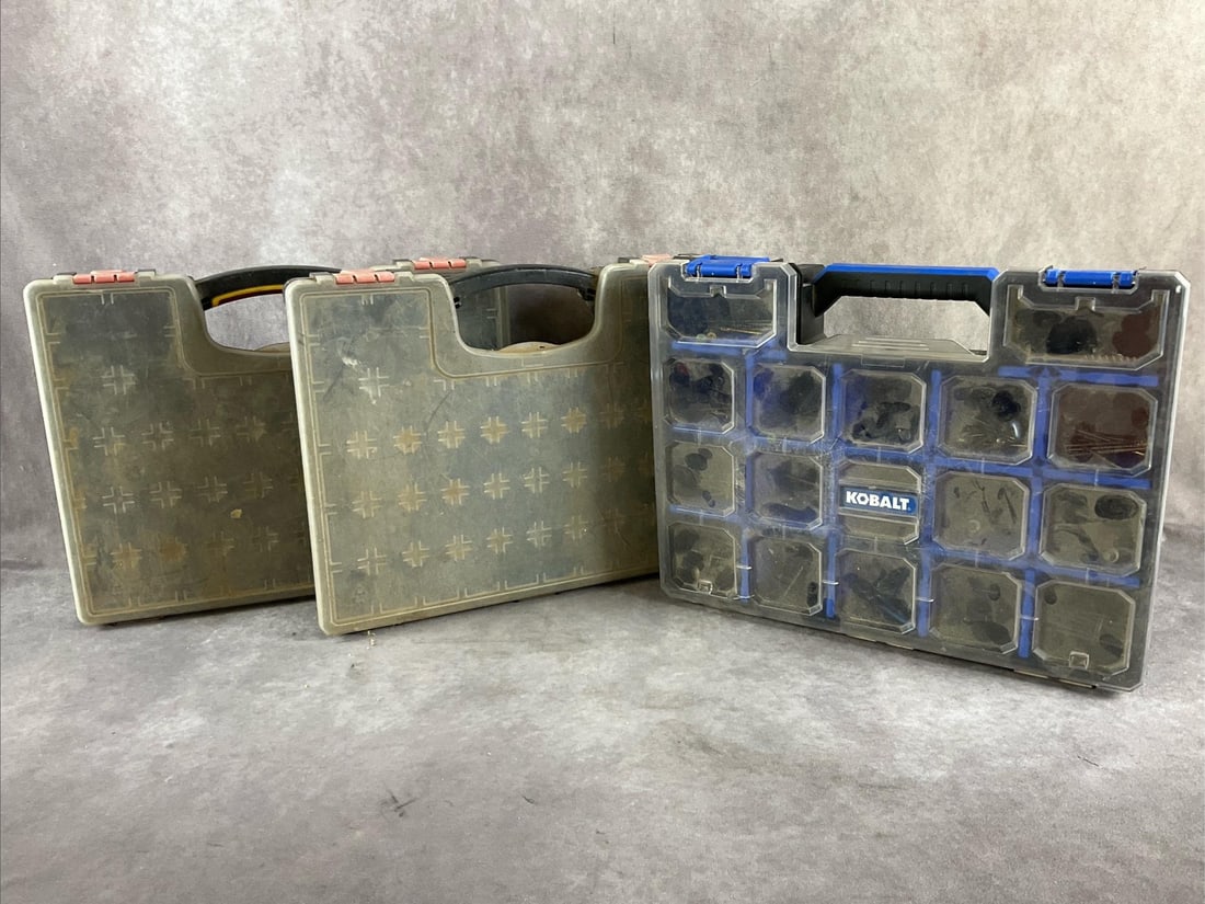 Storage Containers: Three small parts organizers. Used, in working condition. Largest measures 17 inches long X 13 inches wide X 4 inches deep.
