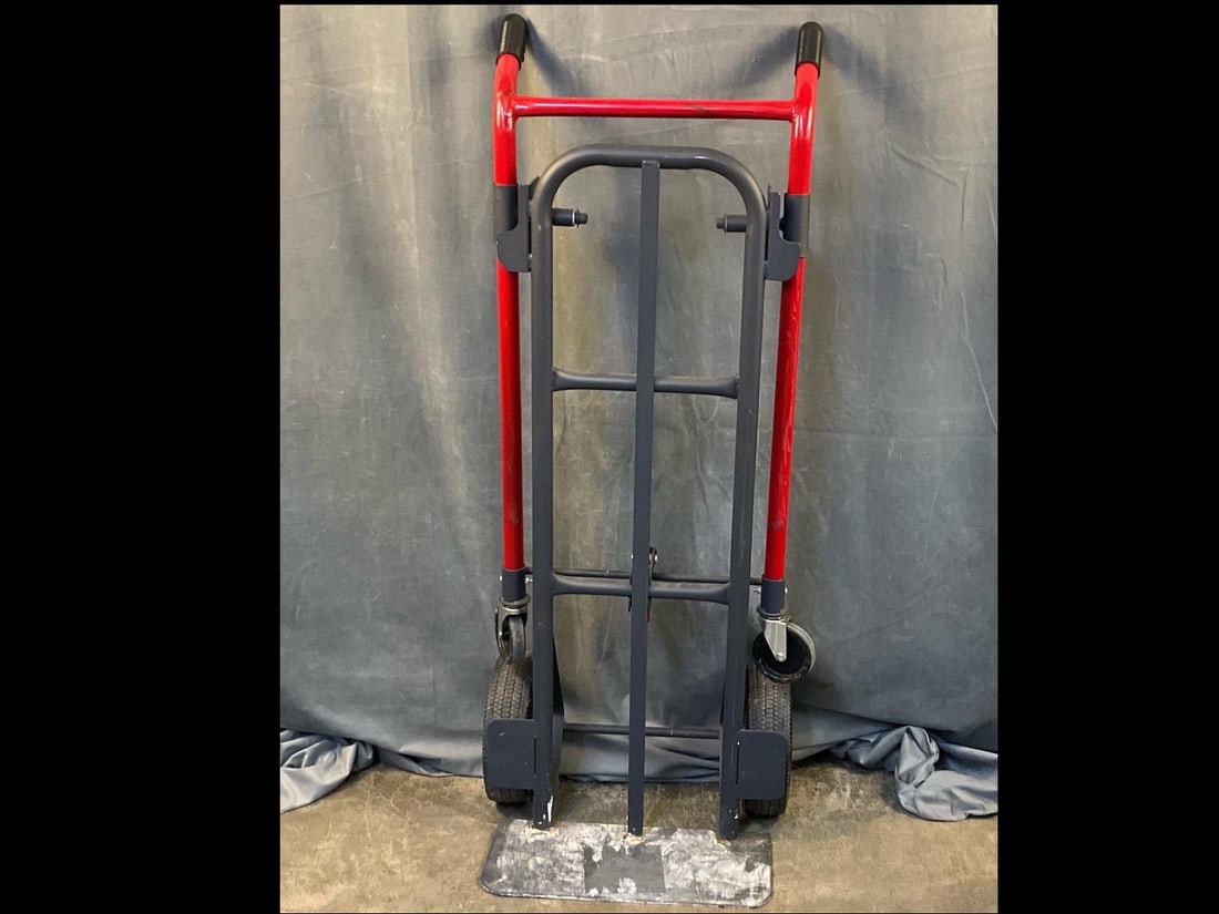 Convertible Hand Truck: Heavy duty convertible 2 in 1 hand truck. Converts from a two wheel hand truck to a four wheel platform cart with a quick release foot lever. Not marked, probably Milwaukee 800 lb. capacity. Good