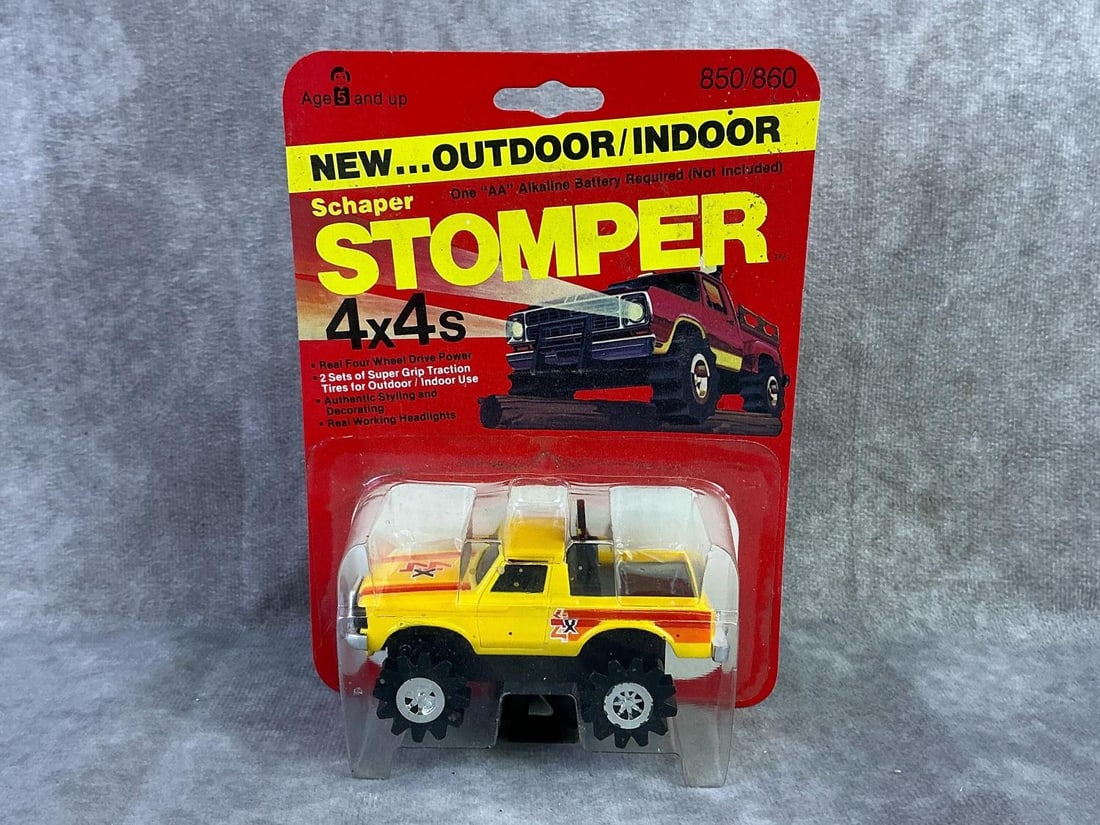 Schaper Stomper: 1980 Chevy Luv car made by Schaper, Hong Kong. In original sealed packaging with mild bowing to cardboard. Measures 4.75 inches wide x 6.5 inches tall.