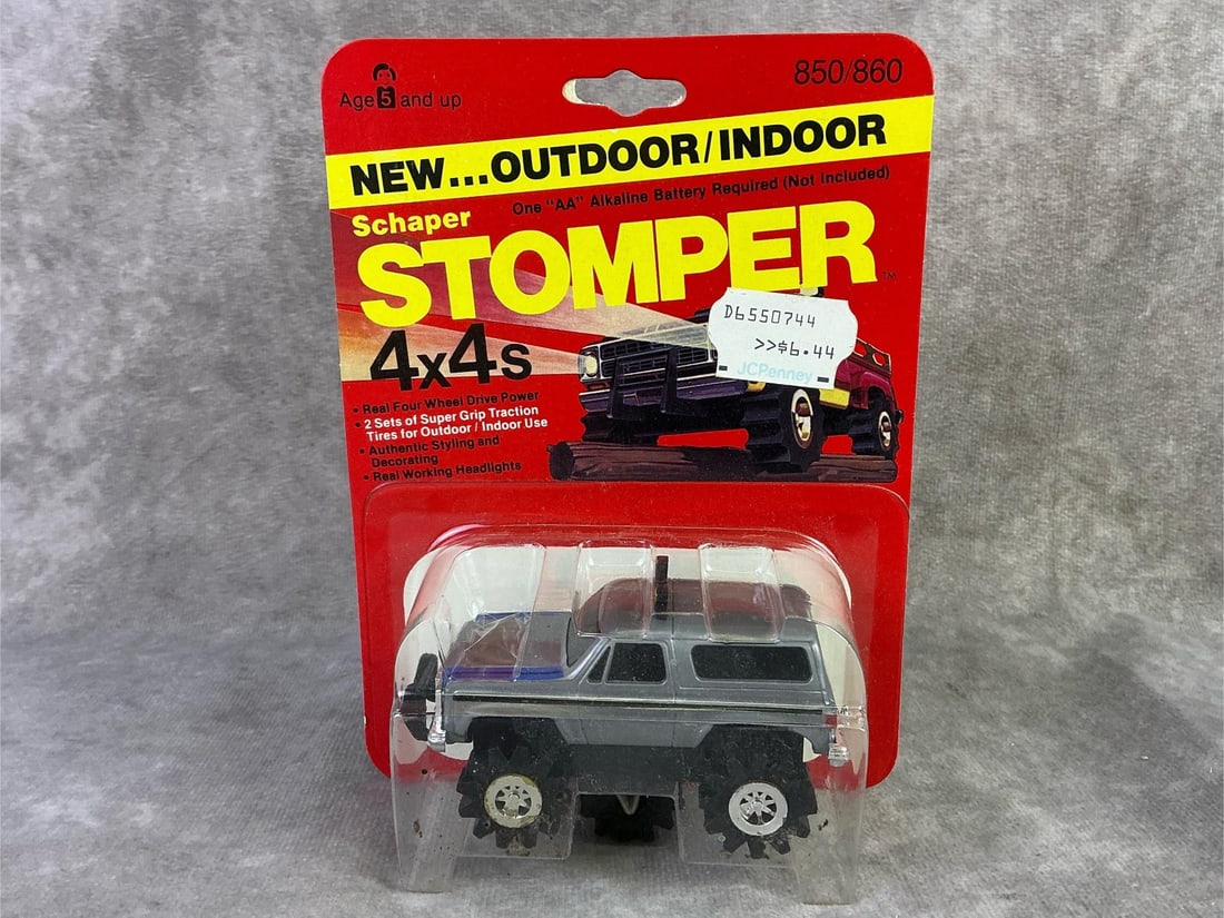 Schaper Stomper: 1980 Chevy Blazer car made by Schaper, Hong Kong. In original sealed packaging with mild bowing to cardboard. Measures 4.75 inches wide x 6.5 inches tall.