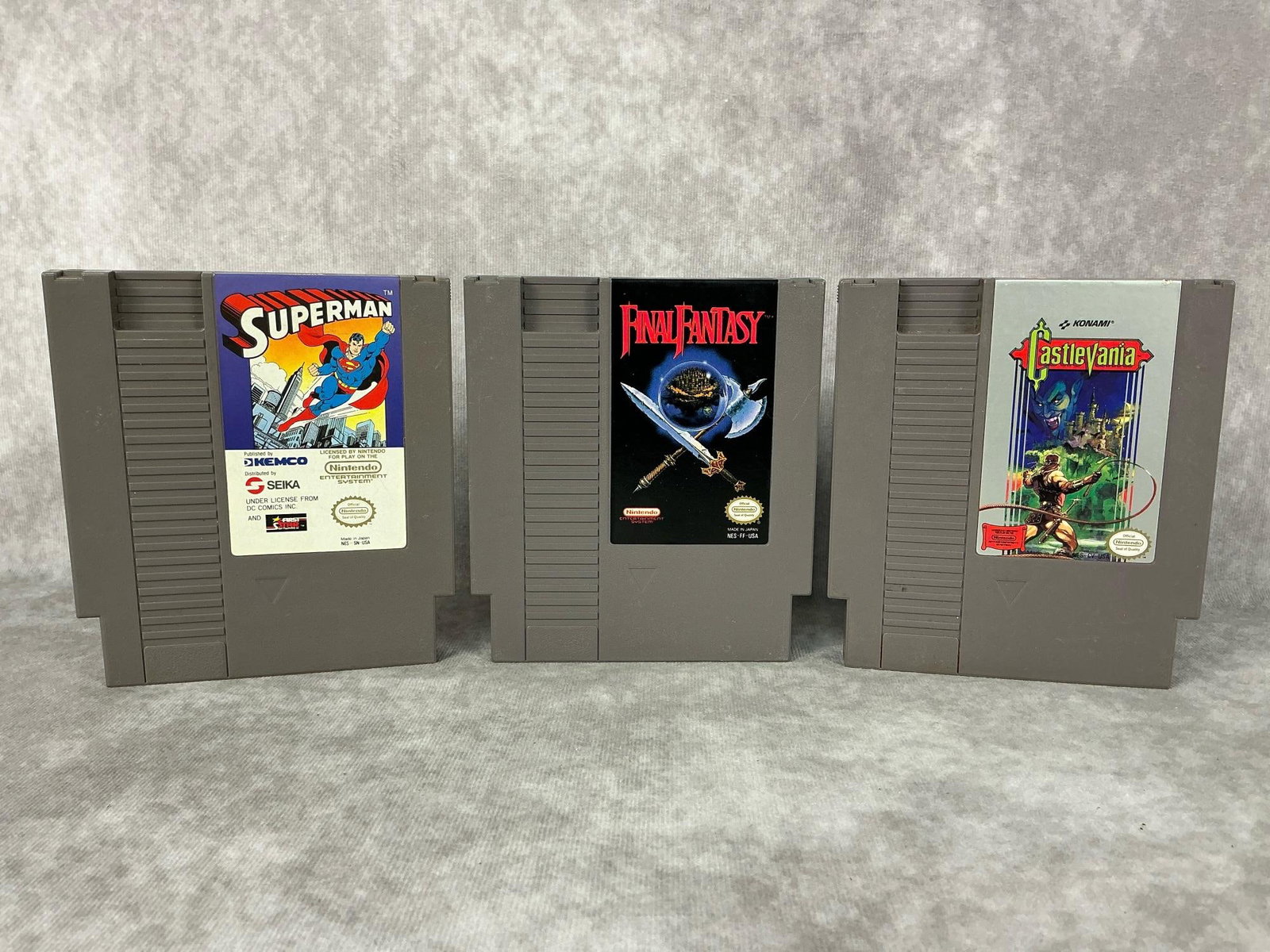 Nintendo Games: Three vintage Nintendo NES games made in Japan. Includes Final Fantasy, Superman, and Castlevania. All games untested, good condition. Each one measures 4.75 inches wide x 5.25 inches tall.