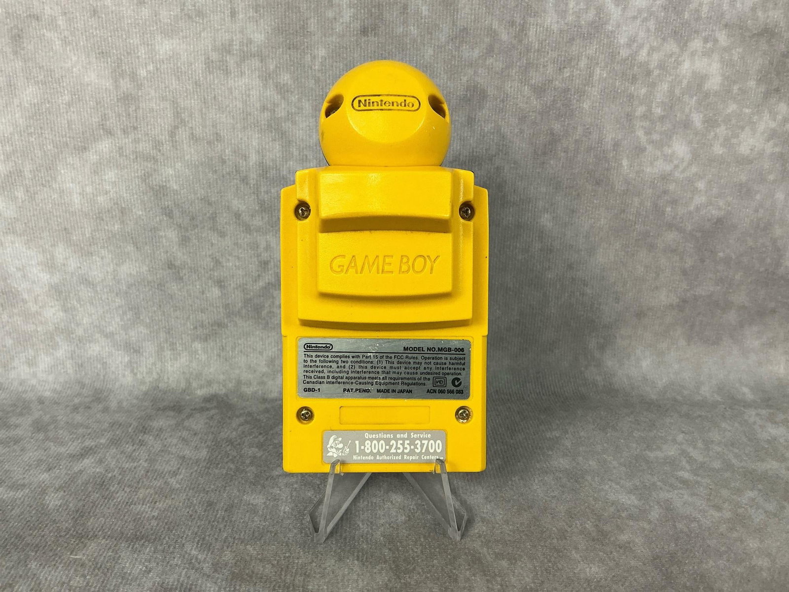 Game Boy Camera: 1998 Game Boy yellow camera accessory, model MGB-006, made in Japan. Untested, some wear. Measures 2.25 inches wide x 4.25 inches tall.