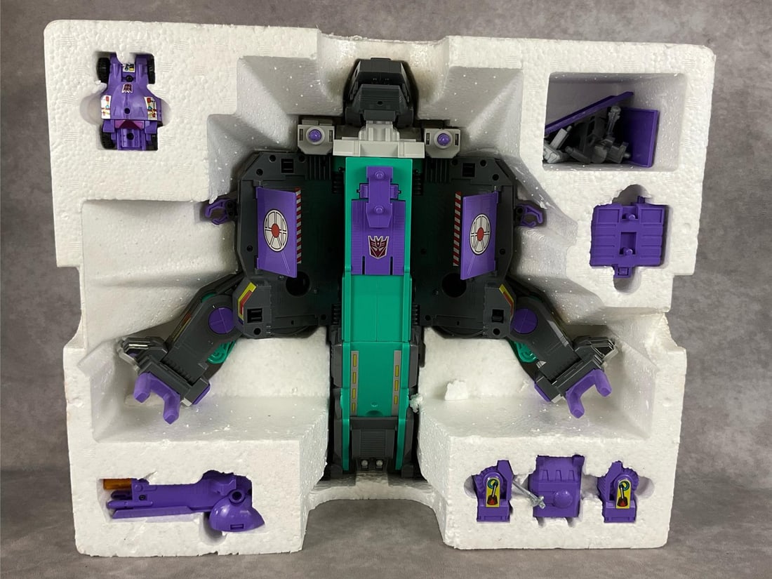 Transformers Evil Deception Trypticon: 1986, 5803.08 Hasbro Company. In original box and packaging, with directions. Has some play wear but is complete and in good condition. Missing promotional poster and sweepstakes. Box is in good