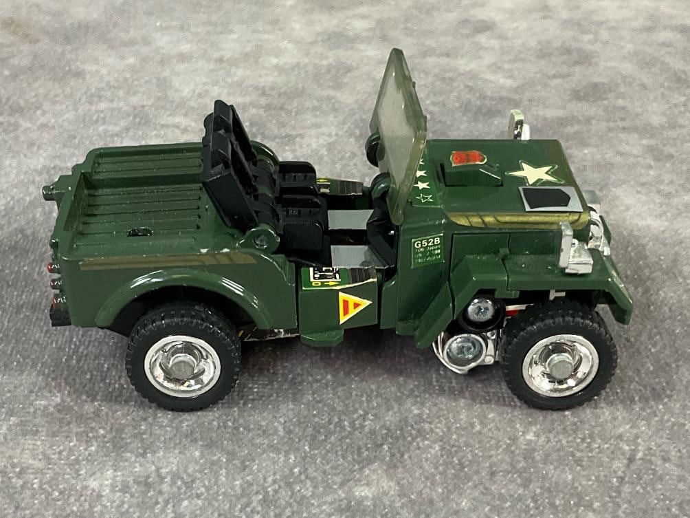 1984 Hound Transformer: Made by Hasbro in Japan. Complete with instruction booklet, catalog, tech spec card, and weapons. Missing decoder. Good condition, but does have minor wear to decals. Measures 3.5 inches long x 2 x 2