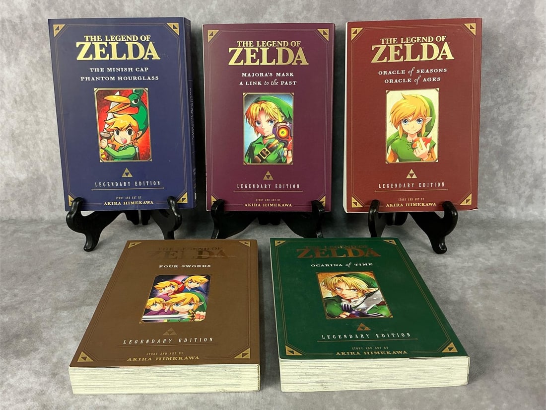 Legend Of Zelda Books: Set of five 2016-2017 Legend of Zelda Legendary Edition books. 2016 Ocarina of Time, 2017 The Minish Cap Phantom Hourglass, 2017 Major’s Mask, 2017 Four Swords, and 2017 Oracle of Seasons. All in