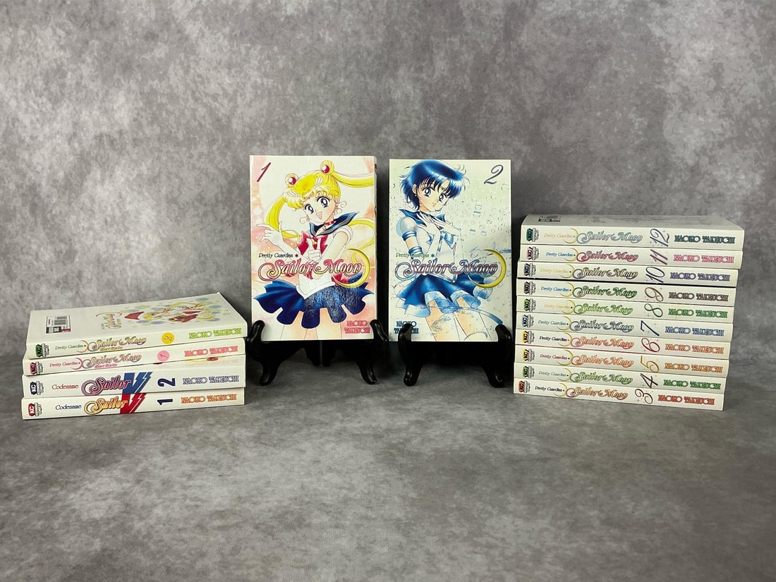 Sailor Moon Books: 2011-2013 complete set of Sailor Moon Pretty Guardian, volumes 1-12. 2013 Sailor Moon Pretty Guardian short stories, volume one and two. 2011 Sailor Moon Codename, volume one and two. Good condition.