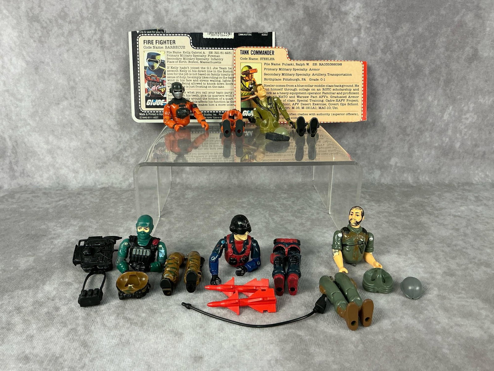 1980’s G.I. Joes: 1982-1986 G.I. Joe action figures made by Hasbro in Hong Kong. 1985 Barbecue with file card, 1982 straight arm Steeler with file card and helmet with visor, 1986 Beach Head with backpack and shoulder