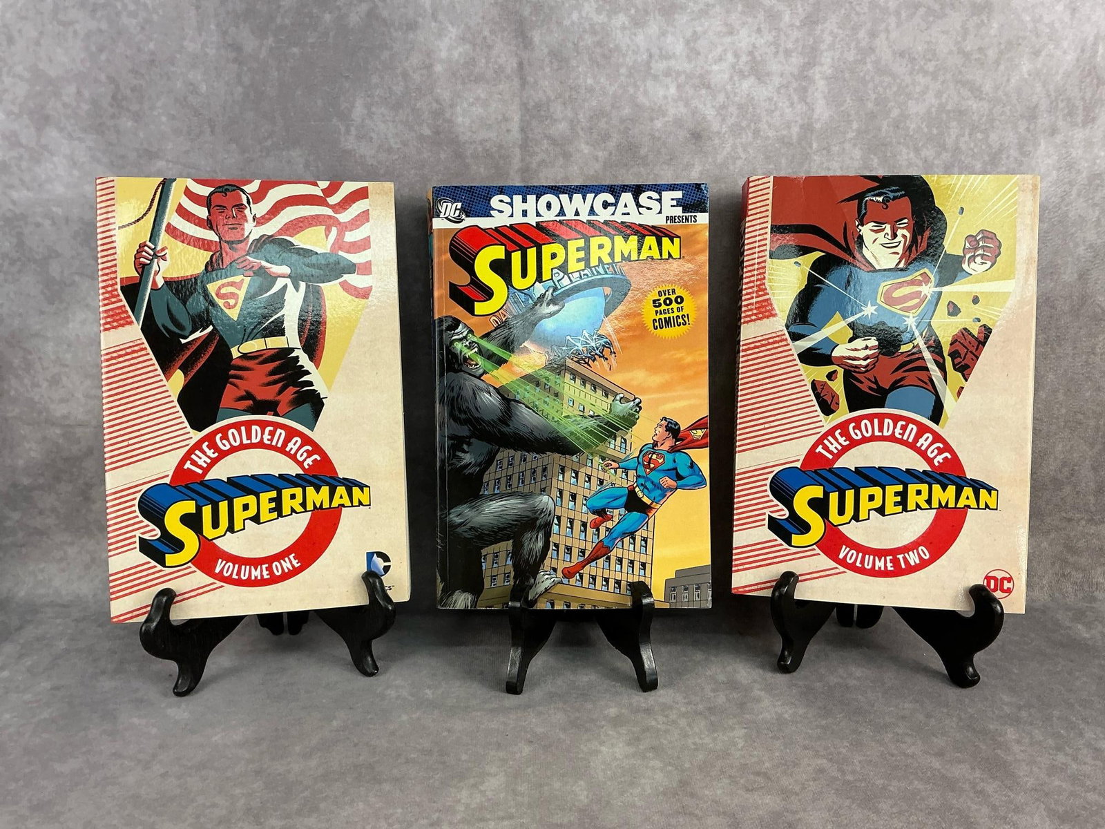 Superman Comic Books: Two, 2016, Superman The Golden Age comic books volume one and two. 2006 Superman Showcase comic book. Good condition. Largest measures 6.5 inches wide x 1.25 x 10 inches tall.