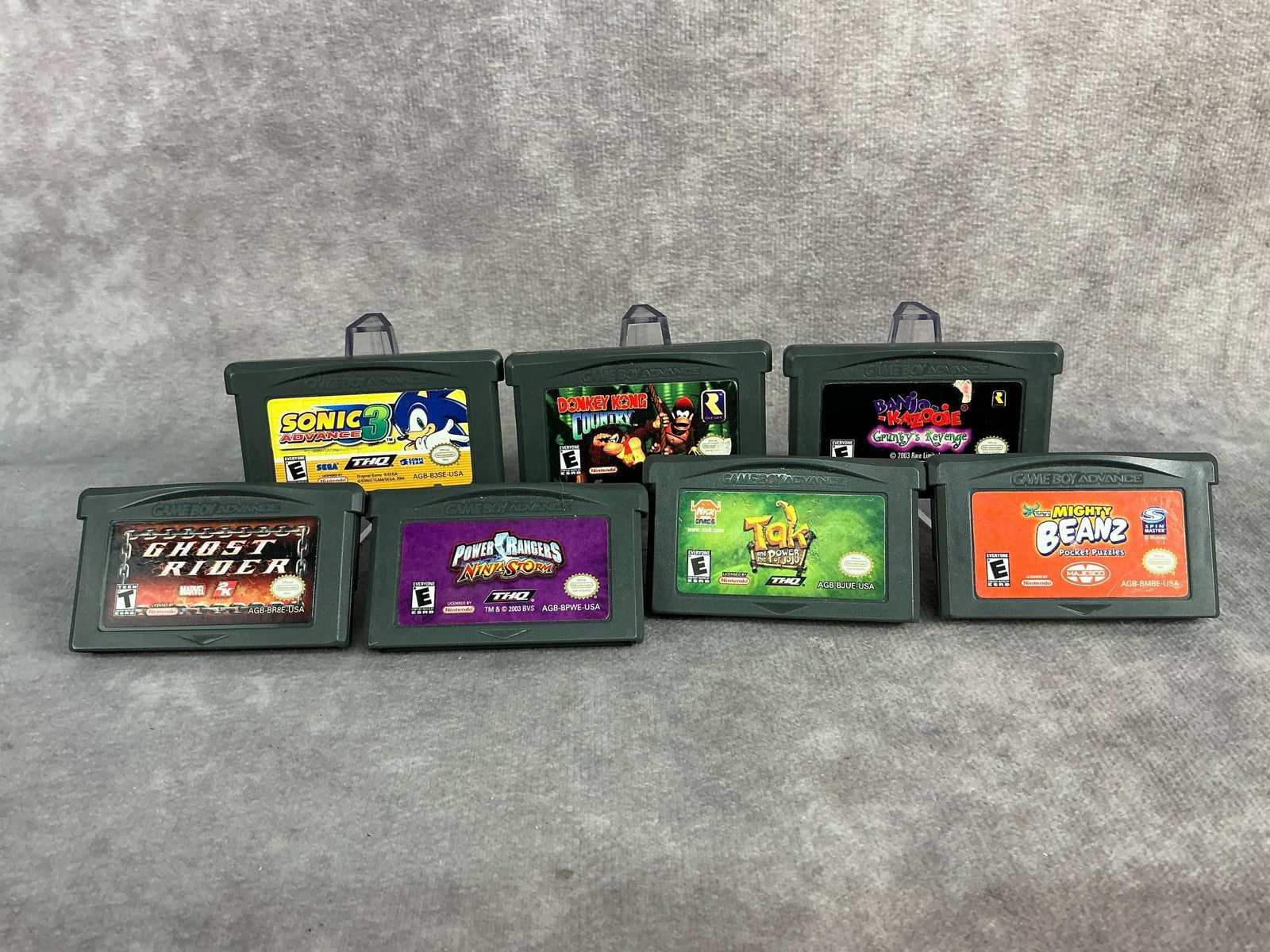 Game Boy Advance Games: Seven vintage original Game Boy Advance games. Includes Sonic 3, Donky Kong Country, Banjo-Kazooie, Power Rangers, Ghost Rider, Tak, and Mighty Beans. All games are untested but in good condition, som