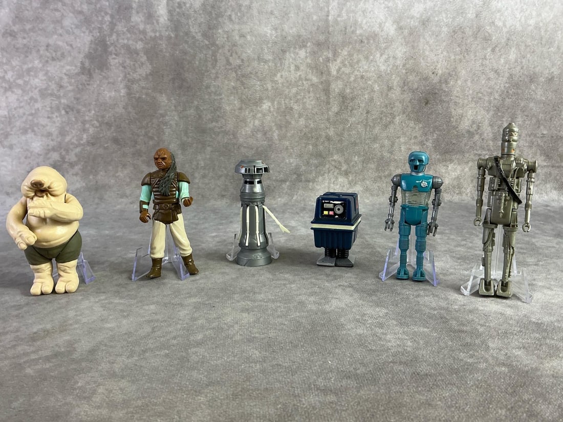 Star Wars Figures: Six Star Wars figures from the 1980s including Droopy, Weequay, IG 88, FX 7, HK 7063, and Power Droid. All in fair to good condition with some paint loss. Weeguay measures 4 inches tall x 1.5 inches