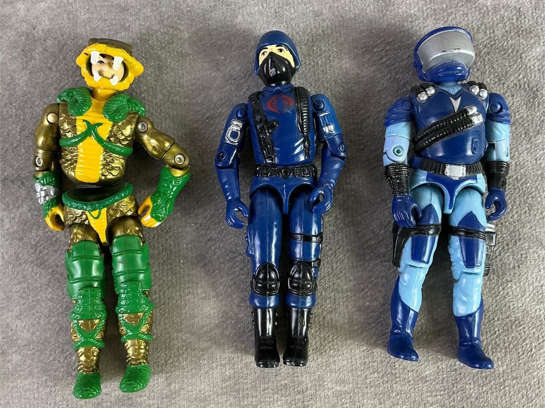 GI Joe Figures: Three GI Joe figures including 1986 Serpentor Cobra Emperor, 1983 Cobra Trooper, and 1986 Motor Viper. All in fair to good condition with loose torsos and on disconnected torso. Serpentor measures 4