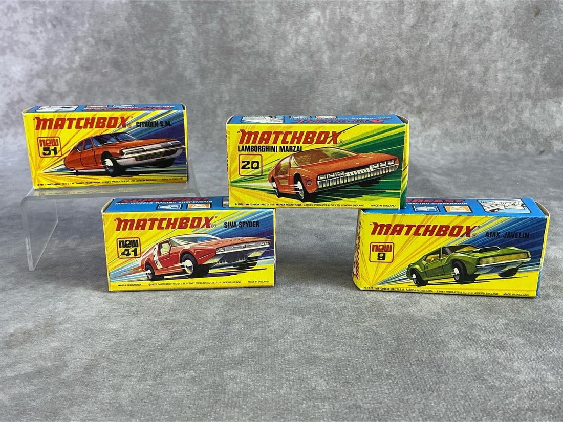 Matchbox Cars: Four 1970s Matchbox cars including Citroen SM, AMX Javelin, Lamborghini Marzal, and Siva Spyder. All in good condition and come with original box. Each measures 3.15 inches wide x 1 inch tall.