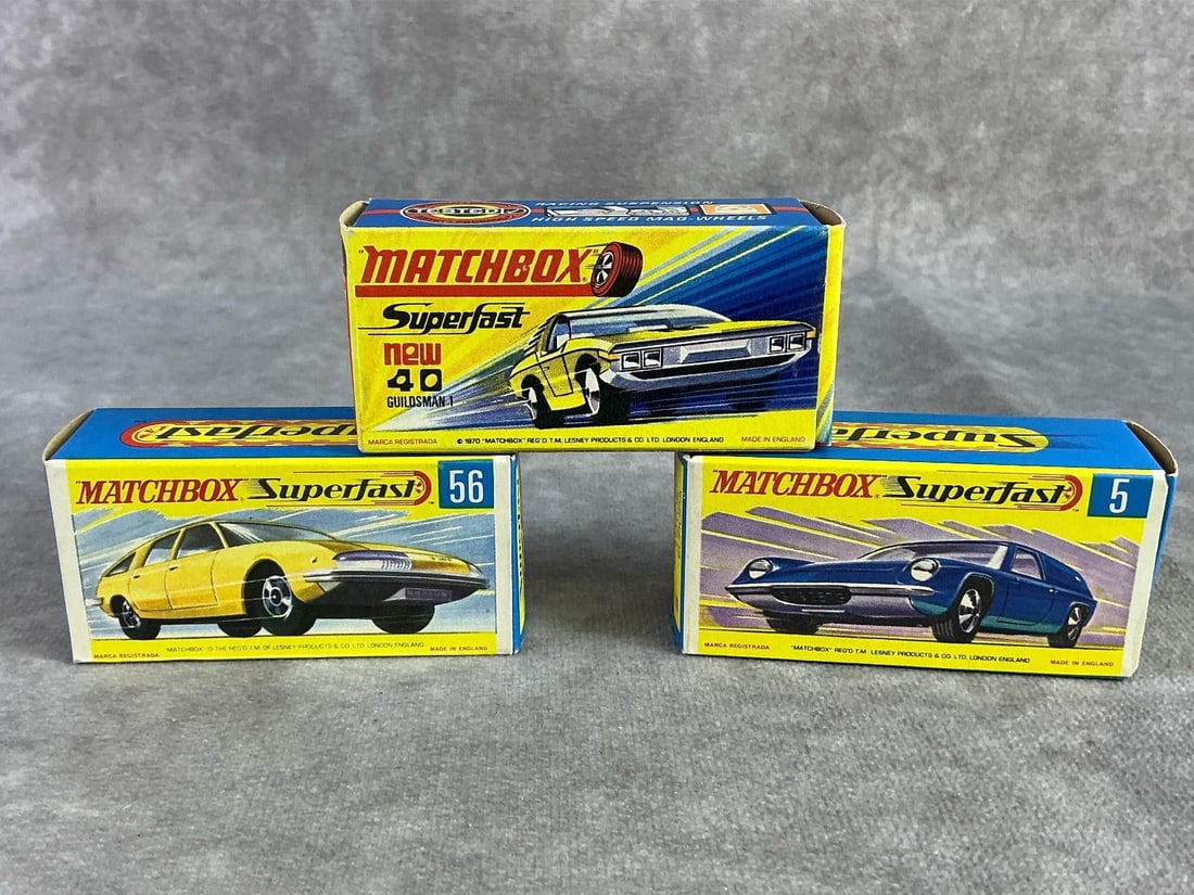 Matchbox Cars: Three mid century Matchbox cars including Guildsman 1, BMC 1800, and Lotus Europa. All in good condition and come with original box. Each measures 3.15 inches wide x 1 inch tall.
