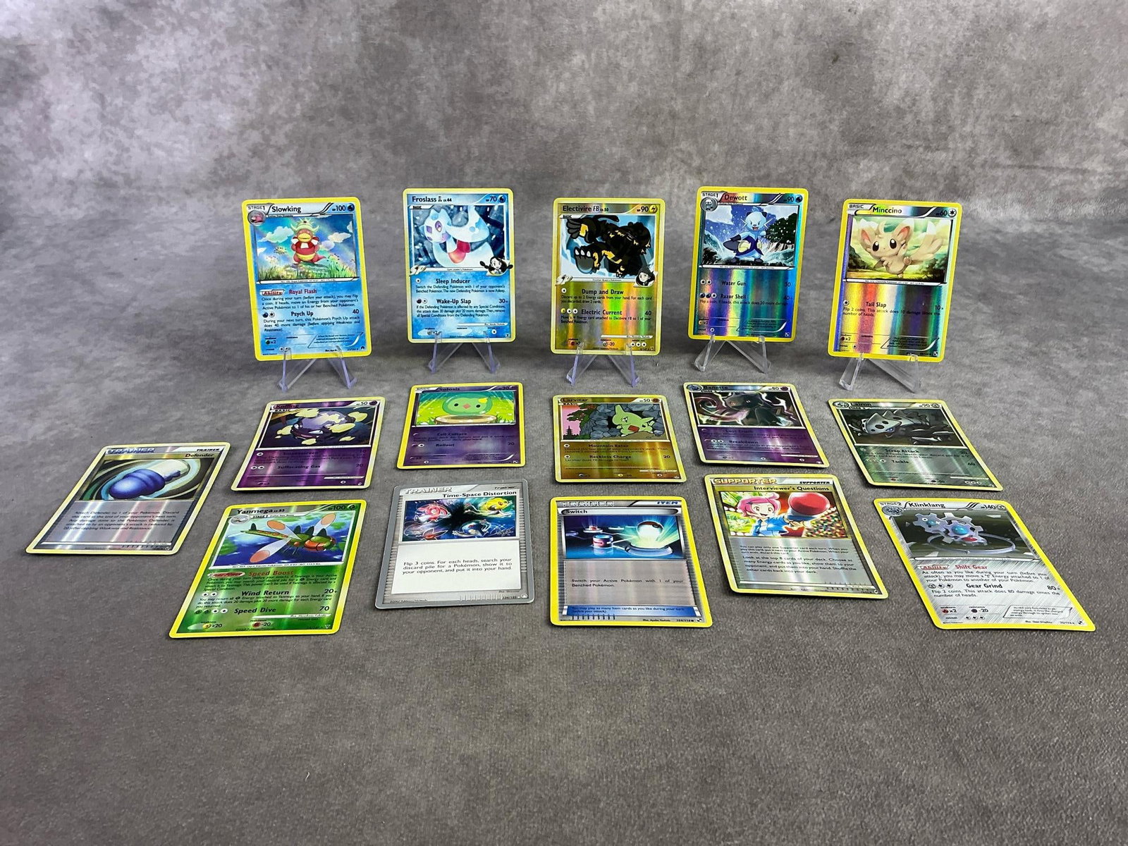 Pokemon Cards: Sixteen Pokemon cards from 2007 through 2016. Includes Basic, Stage one, Trainer and Supporter. All appear in good condition and each measures 2.5 inches wide x 3.25 inches tall.