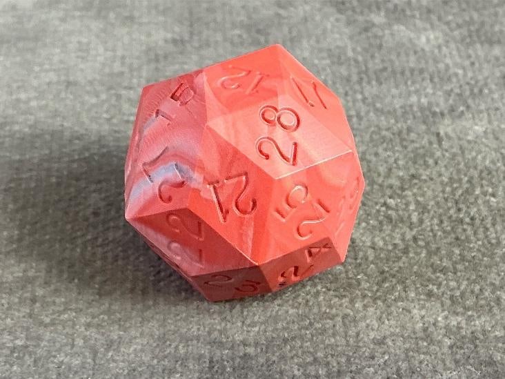 D30 Die: Vintage D30 rhombic triacontahedron thirty sided die. Commonly used for role play games like D&D. In good condition.
