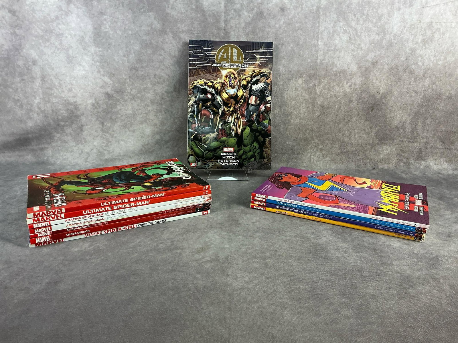 Modern Comics: Twelve modern Marvel comics including Spider-Man, Age of Ultron, Captain America, and more. All in good condition. Each measures 6.5 inches wide x 10 inches tall.