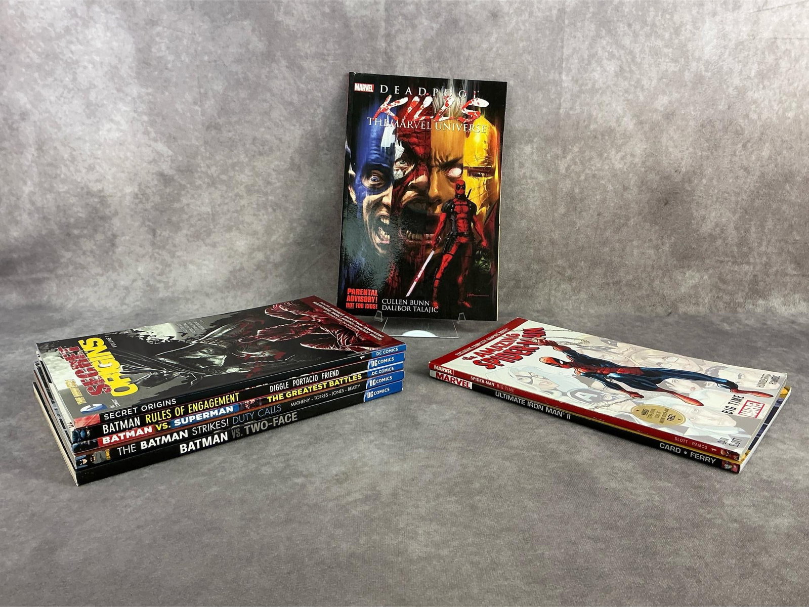 Modern Comics: Eight modern Marvel and DC comics including Spider-Man, Batman, and more. All in good condition. Each measures 6.5 inches wide x 10 inches tall.