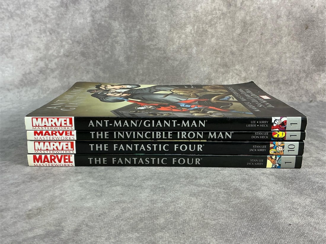 Marvel Masterworks: Four modern Marvel Masterworks comics including Ant Man, Iron Man, and The Fantastic Four. All in good condition. Each measures 6.5 inches wide x 10 inches tall.
