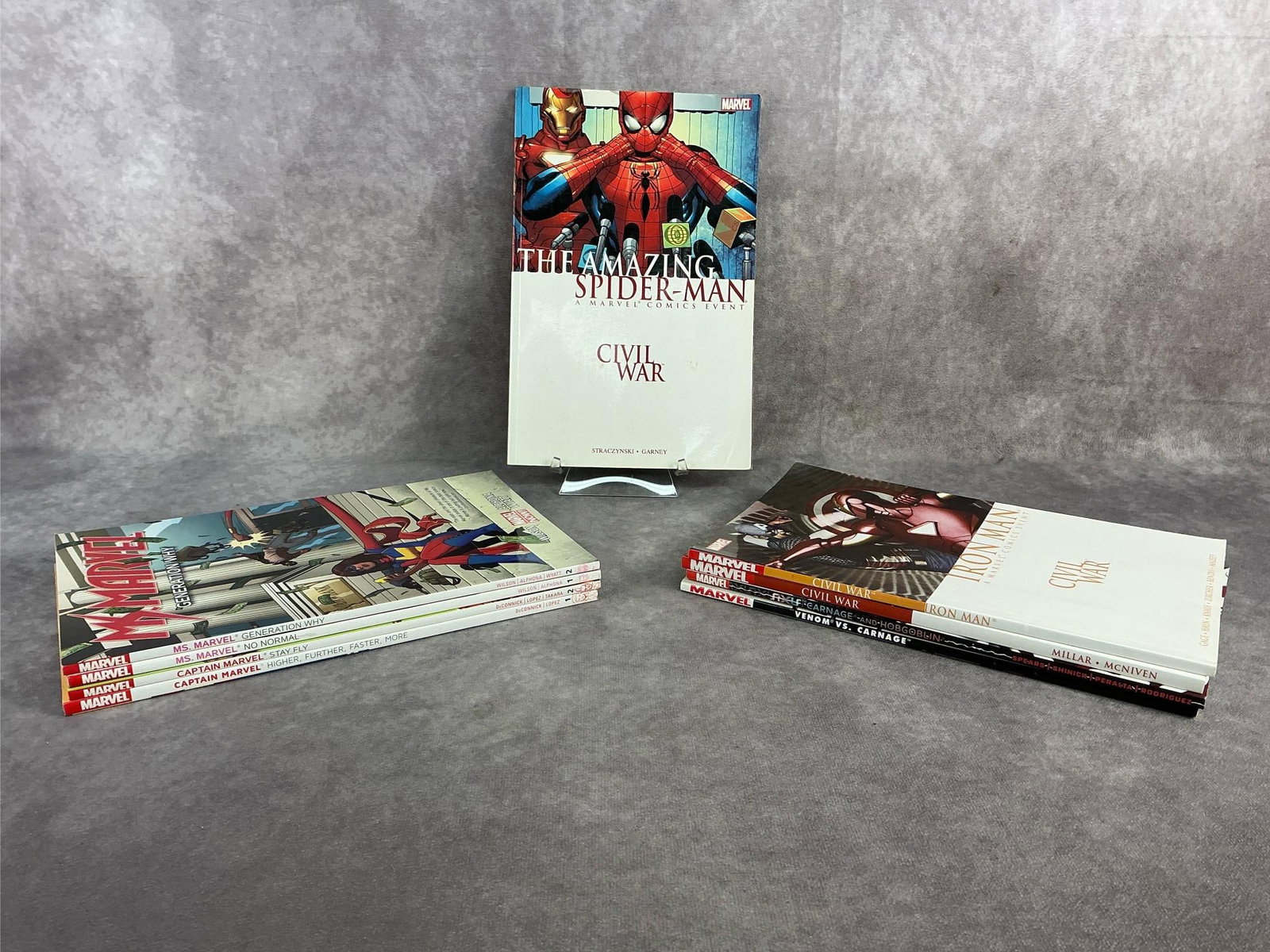 Modern Comics: Nine modern Marvel comics including Spider-Man, Iron Man, Captain Marvel and more. All in good condition. Each measures 6.5 inches wide x 10 inches tall.