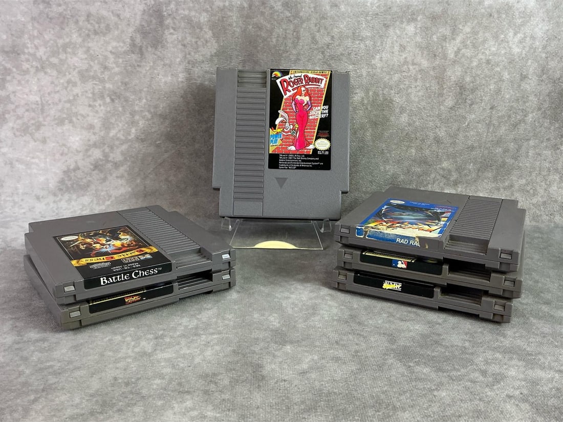 NES Games: Six NES Nintendo Entertainment System Games including Who Framed Roger Rabbit, Battle Chess, Back to the Future, and more. All in good untested condition. Each measures 4.65 inches wide x 5.25 inches 