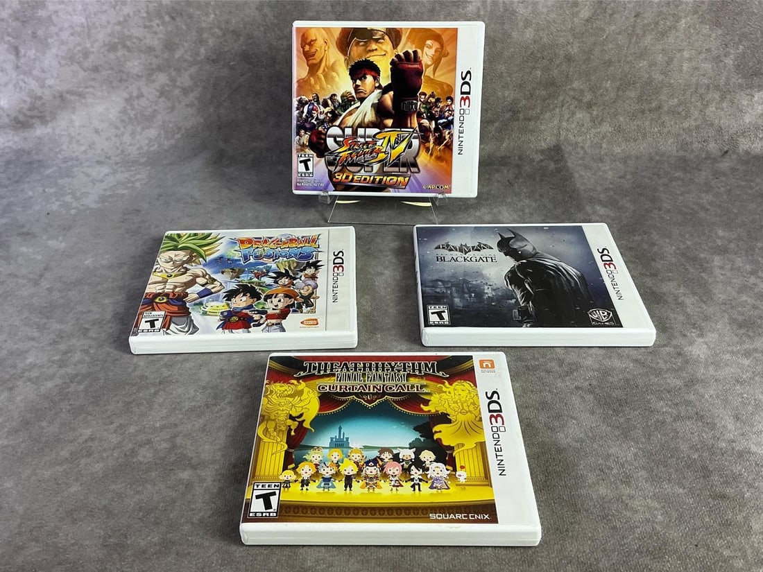 Nintendo 3DS Games: Four Nintendo 3DS games including Street Fighter, Batman, DragonBall, and Final Fantasy. All in good untested condition. Each measures 5.25 inches wide x 4.75 inches tall.