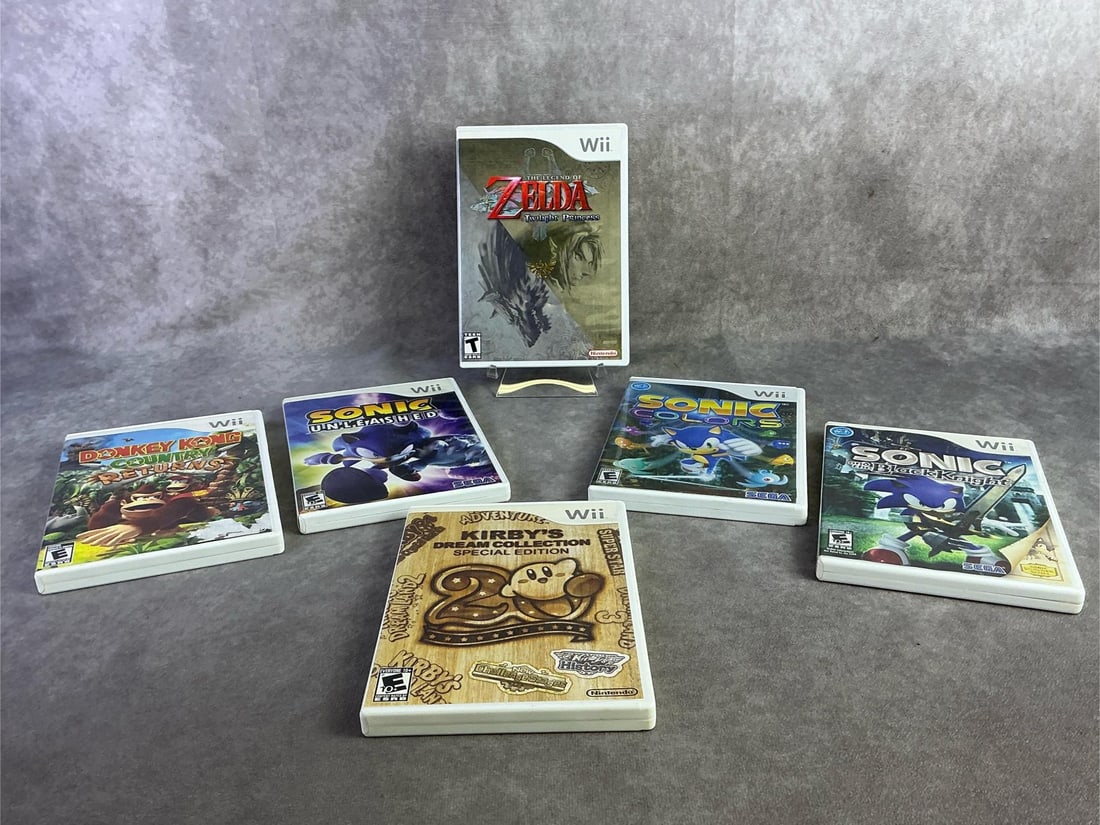 Wii Games: Six Nintendo Wii games including Zelda, Sonic, Donkey Kong, and more. All in good untested condition. Each measures 5.25 inches wide x 7.5 inches tall.