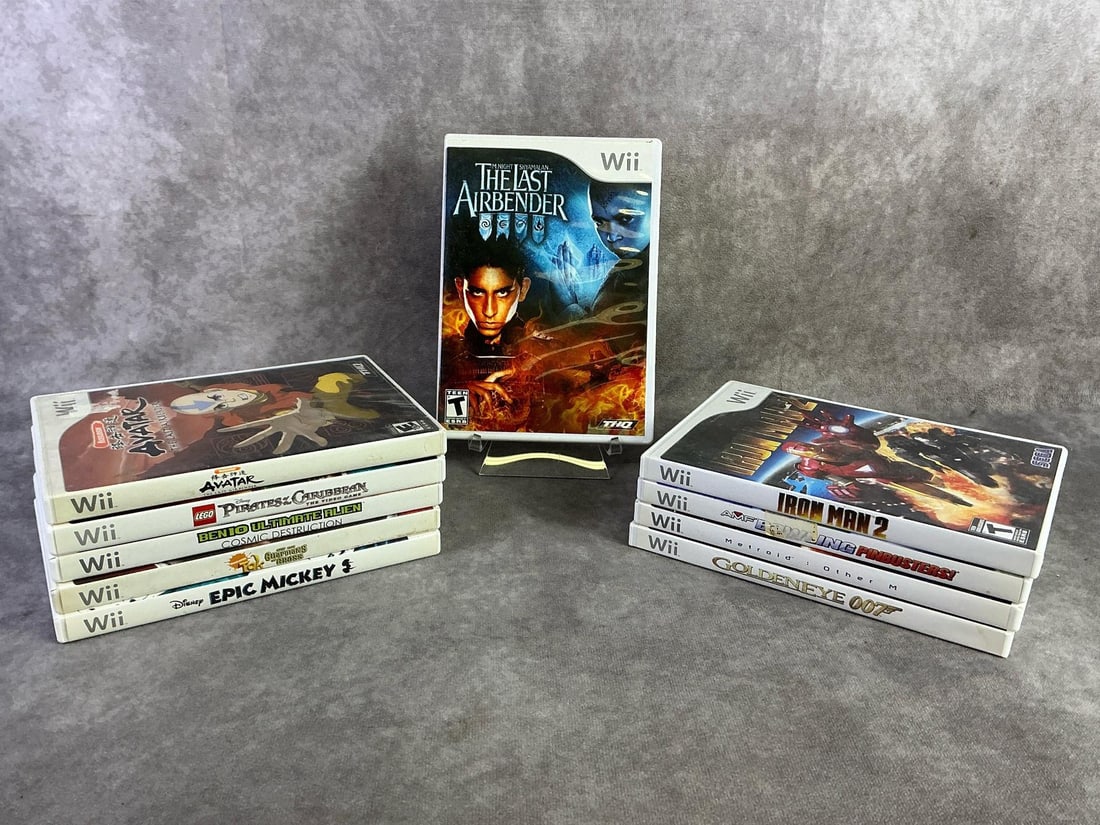 Nintendo Wii Games: Ten Nintendo Wii games including The Last Airbender, Ironman, Ben10, and more. All in good untested condition. Each measures 5.25 inches wide x 7.5 inches tall.