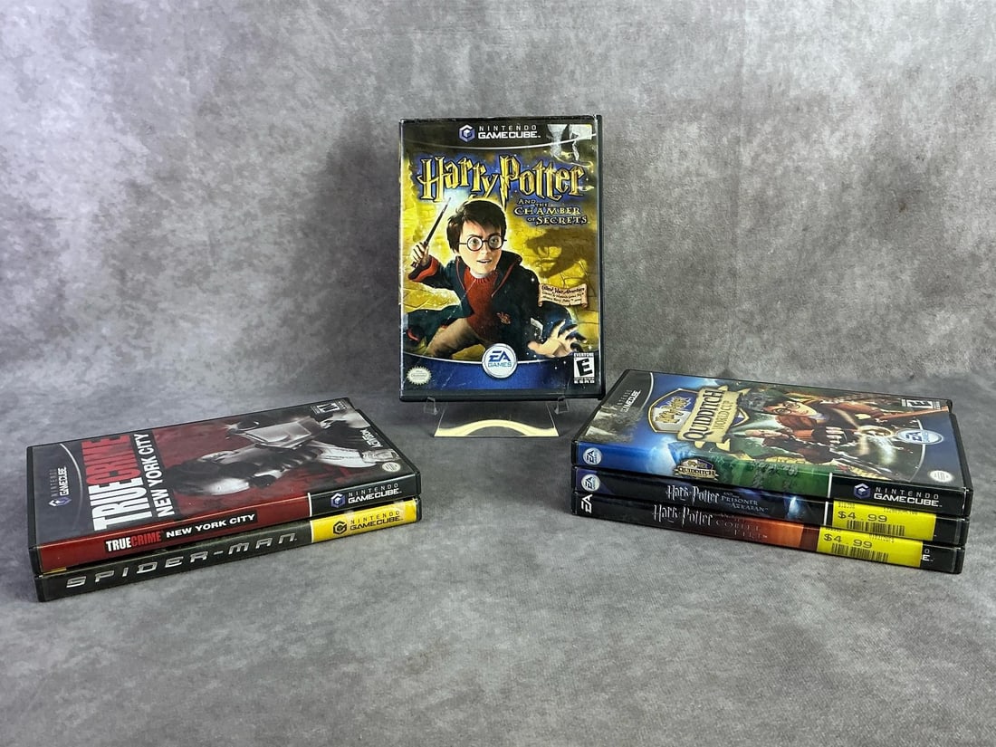 Nintendo GameCube Games: Six vintage Nintendo Game Cube games including Harry Potter, Spider-Man, and True Crime. All in good untested condition. Each measures 5.25 inches wide x 7.5 inches tall.