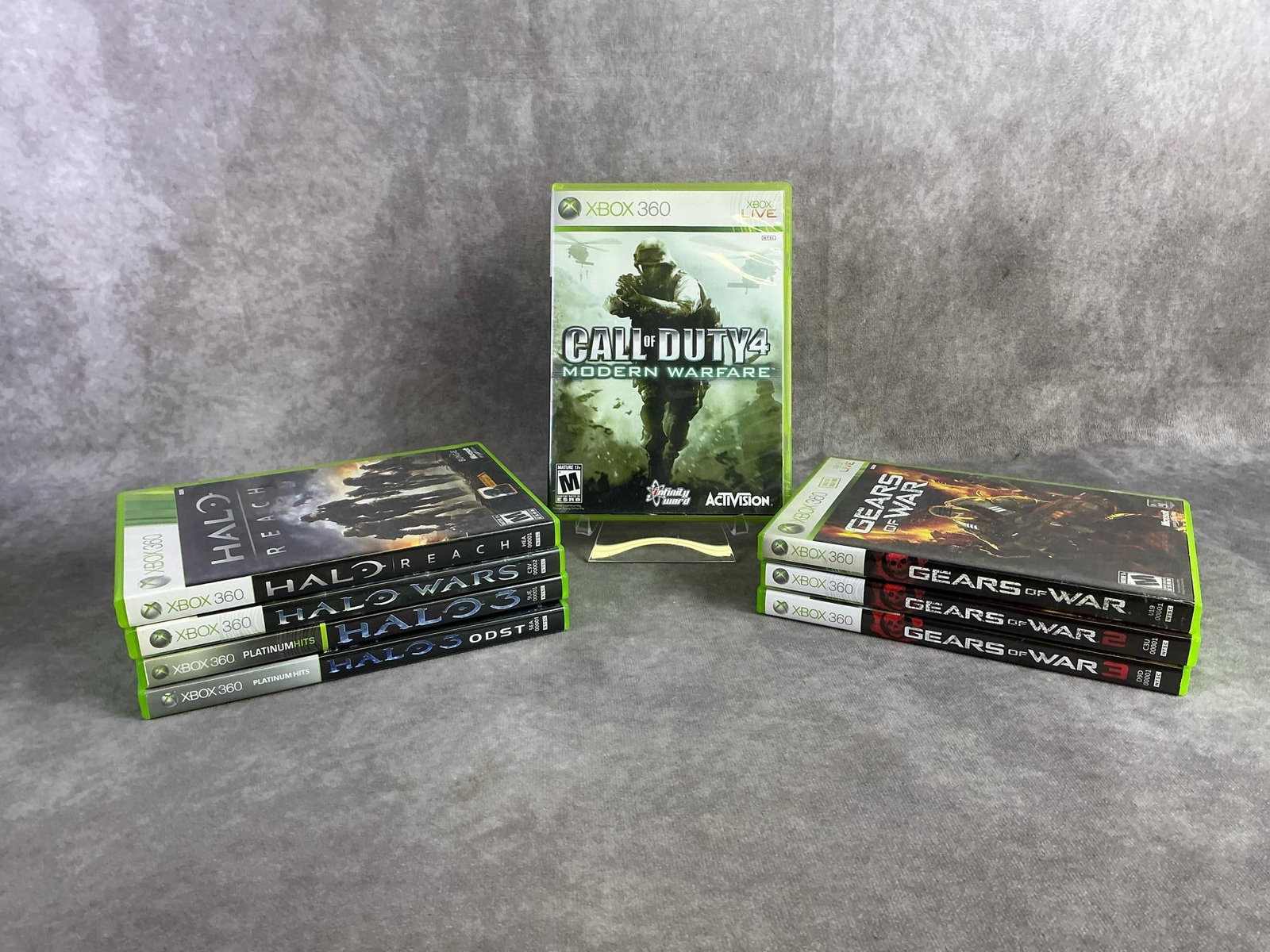 Xbox 360 Games: Eight Xbox 360 games including Call of Duty, Halo, and Gears of War. All in good untested condition. Each measures 5.25 inches wide x 7.5 inches tall.