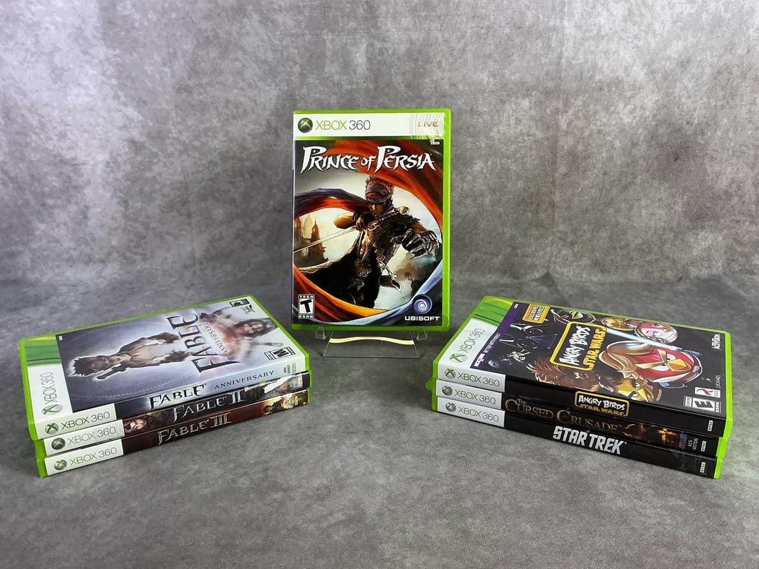 Xbox 360 Games: Seven Xbox 360 games including Fable, Star Trek, Prince of Persia, and more. All in good untested condition. Each measures 5.25 inches wide x 7.5 inches tall.