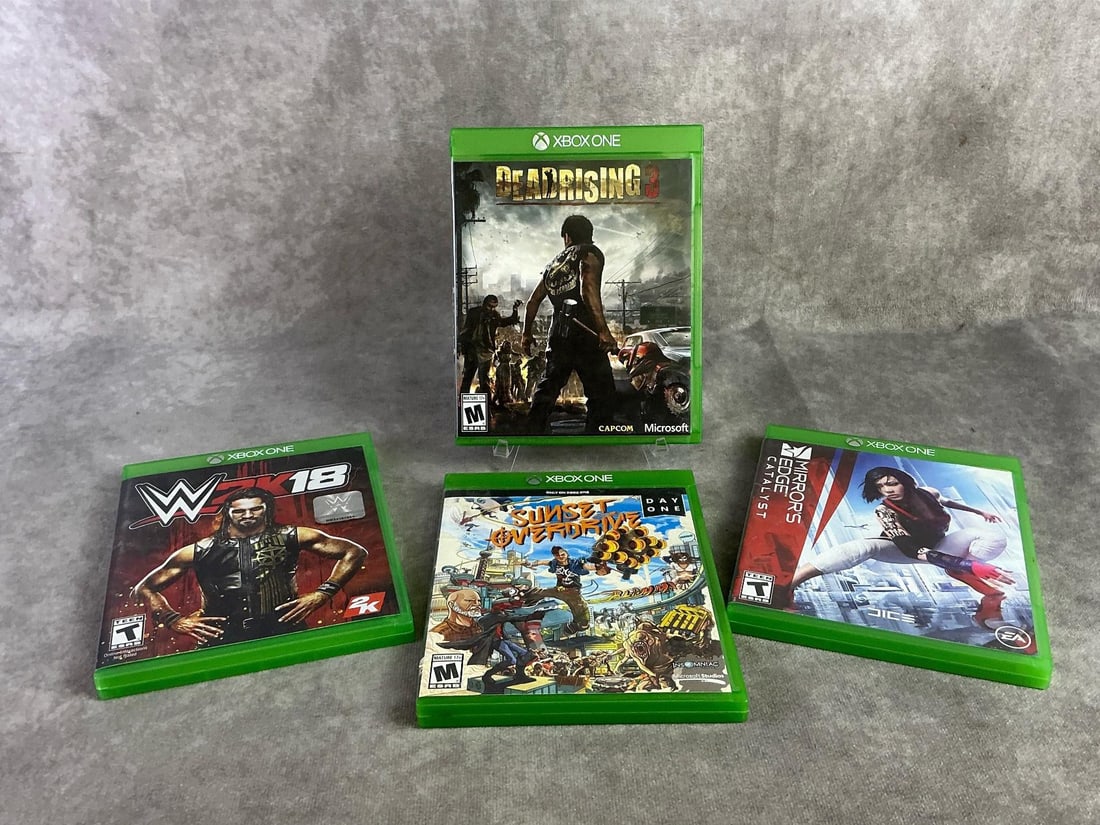 Xbox One Games: Four Xbox One games including Dead Rising 3, WW2k18, Sunset Overdrive, and Mirrors Edge. All in good untested condition. Each measures 5.25 inches wide x 6.5 inches tall.