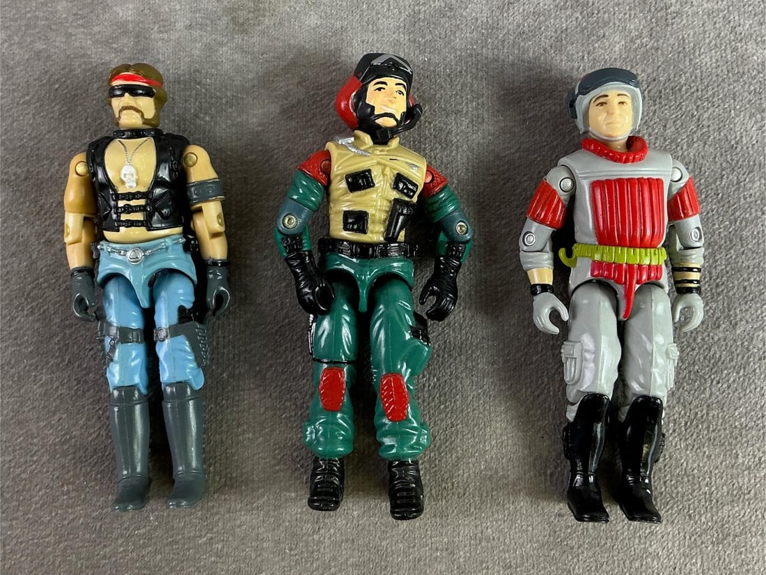 GI Joe Figures: Three 1980s GI Joe figures including Torch, Lift Ticket, and Sneak Peak. All in fair to good condition with Torch having a loose torso. Each measures 1 inch wide x 4 inches tall.