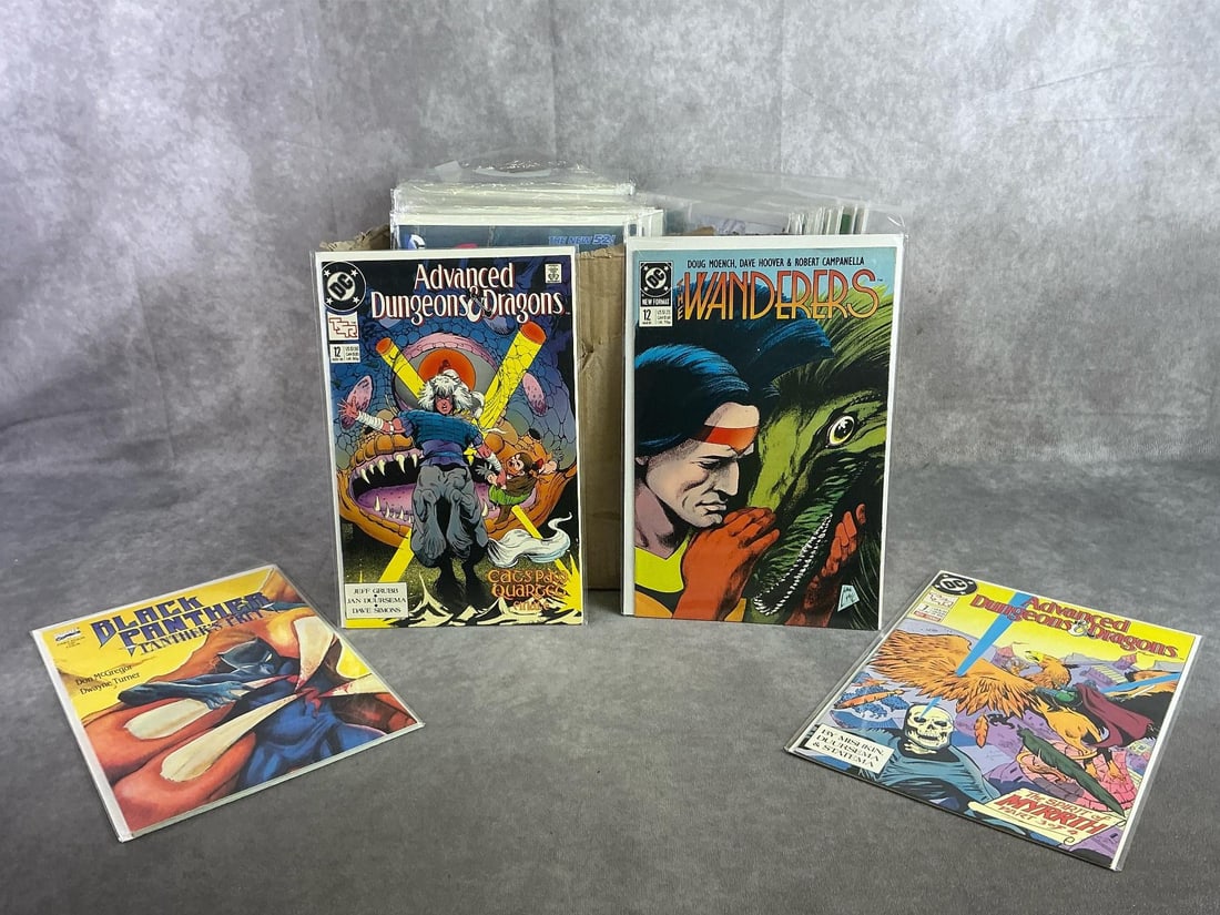 Vintage Comics: Approximately 80 vintage comics including Dungeons & Dragons, Black Panther, Blue Beetle, and more. All in good condition and with plastic sleeve protectors. Box measures 7 inches wide x 14 inches x