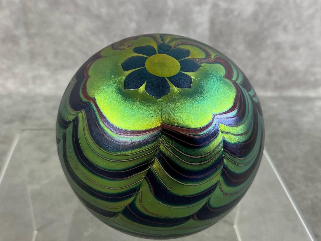 Metallic Art Paper Weight: 1970's paperweight by Lundberg Studios, signed on bottom. Metallic rainbow sheen art glass. In good condition. Measures 3 inches in diameter x 2.75 inches tall.