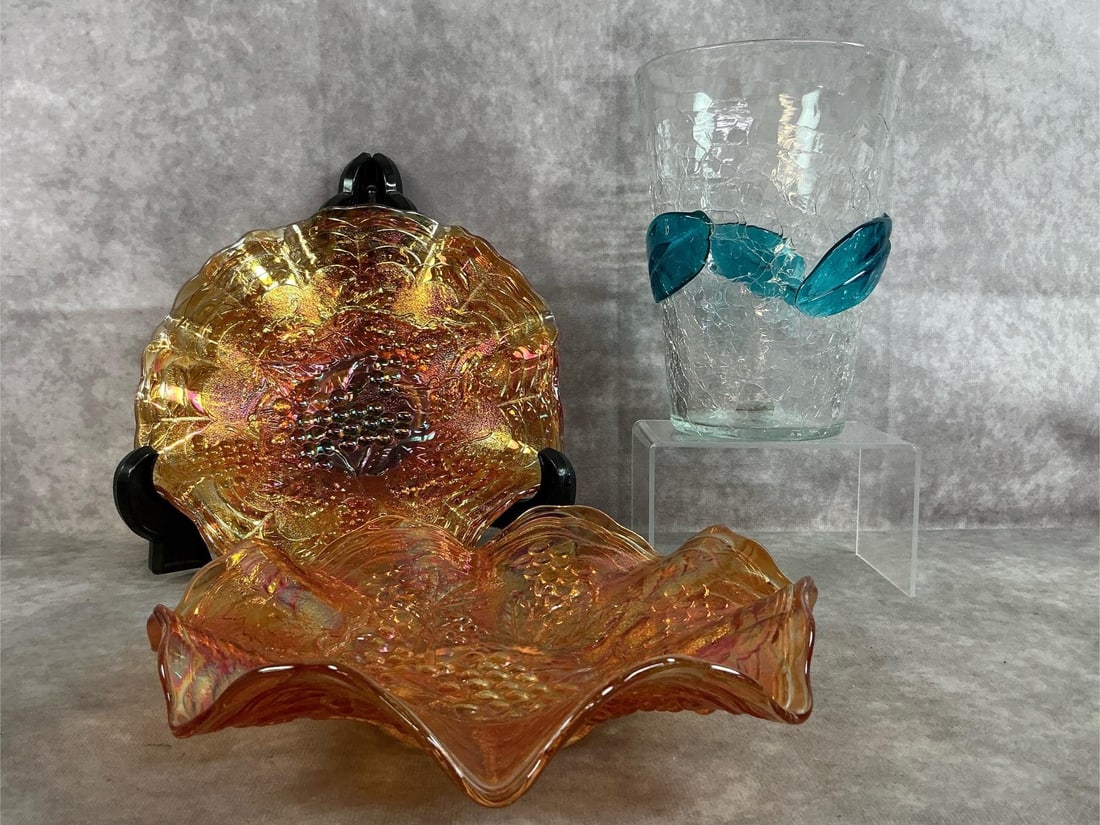 Carnival & Blenko Glass: Three early to mid 1900's glass pieces. Marigold Carnival glass by Imperial with ruffled edges. Blenko crackled glass beaker vase with blue leaves. In good condition. Bowls measure 8.5 inches in