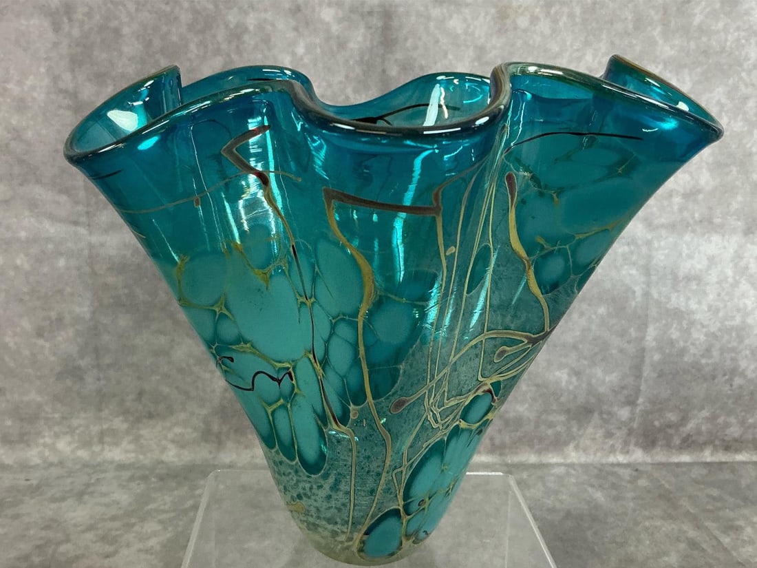 Handkerchief Vase by Bendzunas: Vintage handkerchief vase with abstract design. Aqua and gold web with wavy glass. Signed by artist Paul Bendzunas. Measures 7.5 inches wide x 6.5 inches tall.
