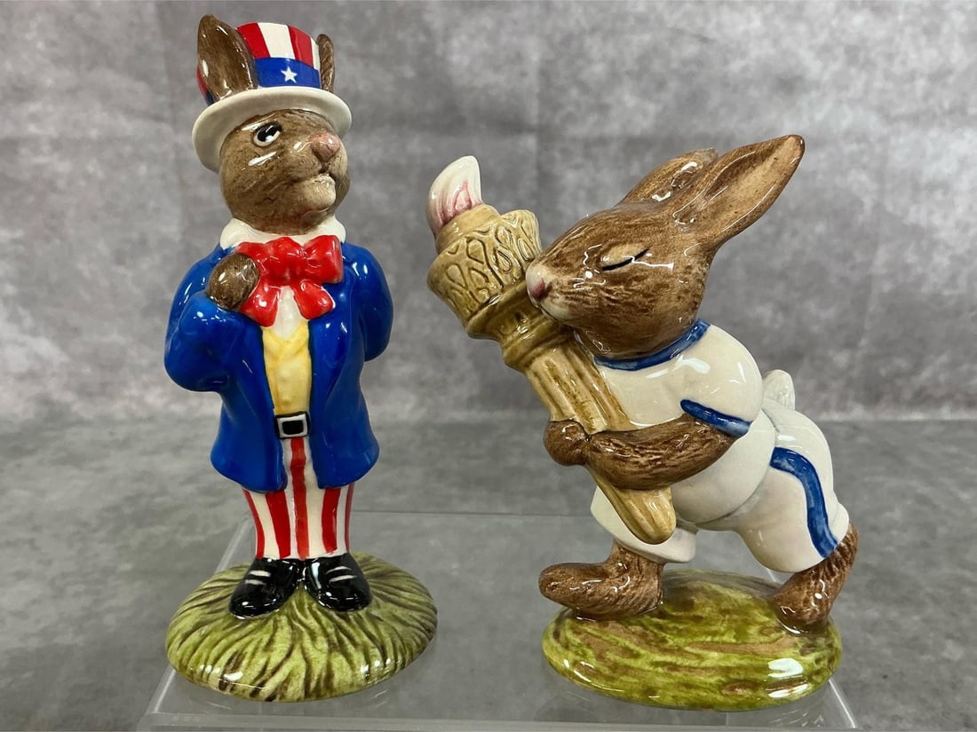 Olympic Bunny & Uncle Sam Bunny: Two Royal Doulton Bunnykins from 1983 and 1985. Uncle Sam #DB 50, and Olympic Bunnykins # DB 28. In good condition. Olympic bunny measures 3 inches wide x 1.5 x 4 inches tall.