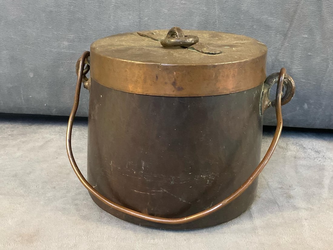 Antique Copper Pot: Late 19th - early 20th century hand wrought dovetailed copper pot with lid and handle. Contains old matchbooks. Good condition. Measures 6 inches in diameter x 5.25 inches tall.