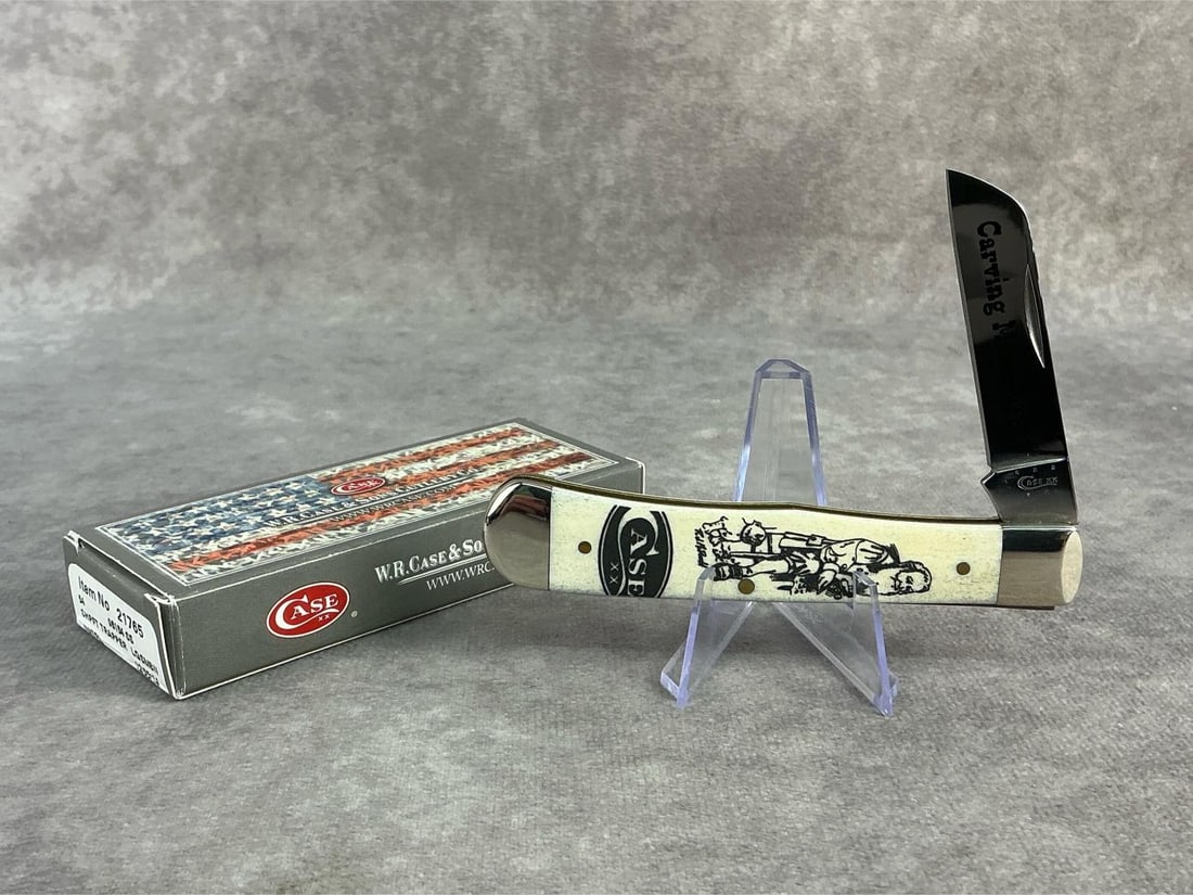 Case XX Knife: 2014 Carving Memories Case XX pocket knife from artist RJ McDonald. Sheepsfoot Trapper, patterned 06154ss, tight snap and comes with original box. Box measures 4.5 inches wide x 1.75 inches tall.